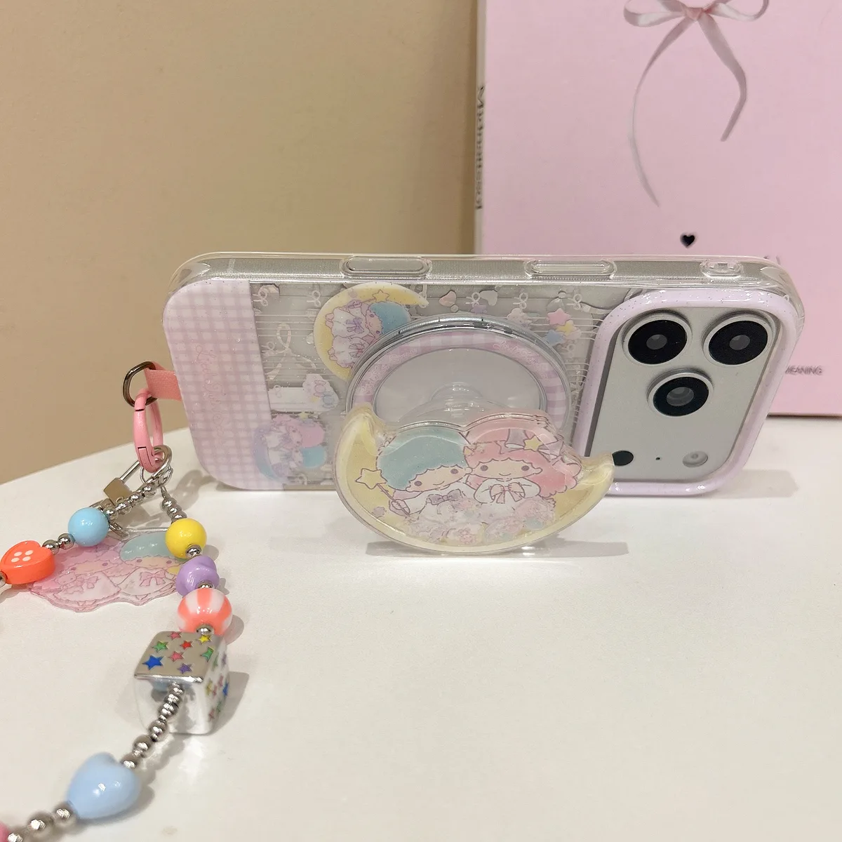 Little Twin Stars Glitter Phone Case with Beaded Strap and Pop Out Grip for iPhone 17 16 15 Pro Max