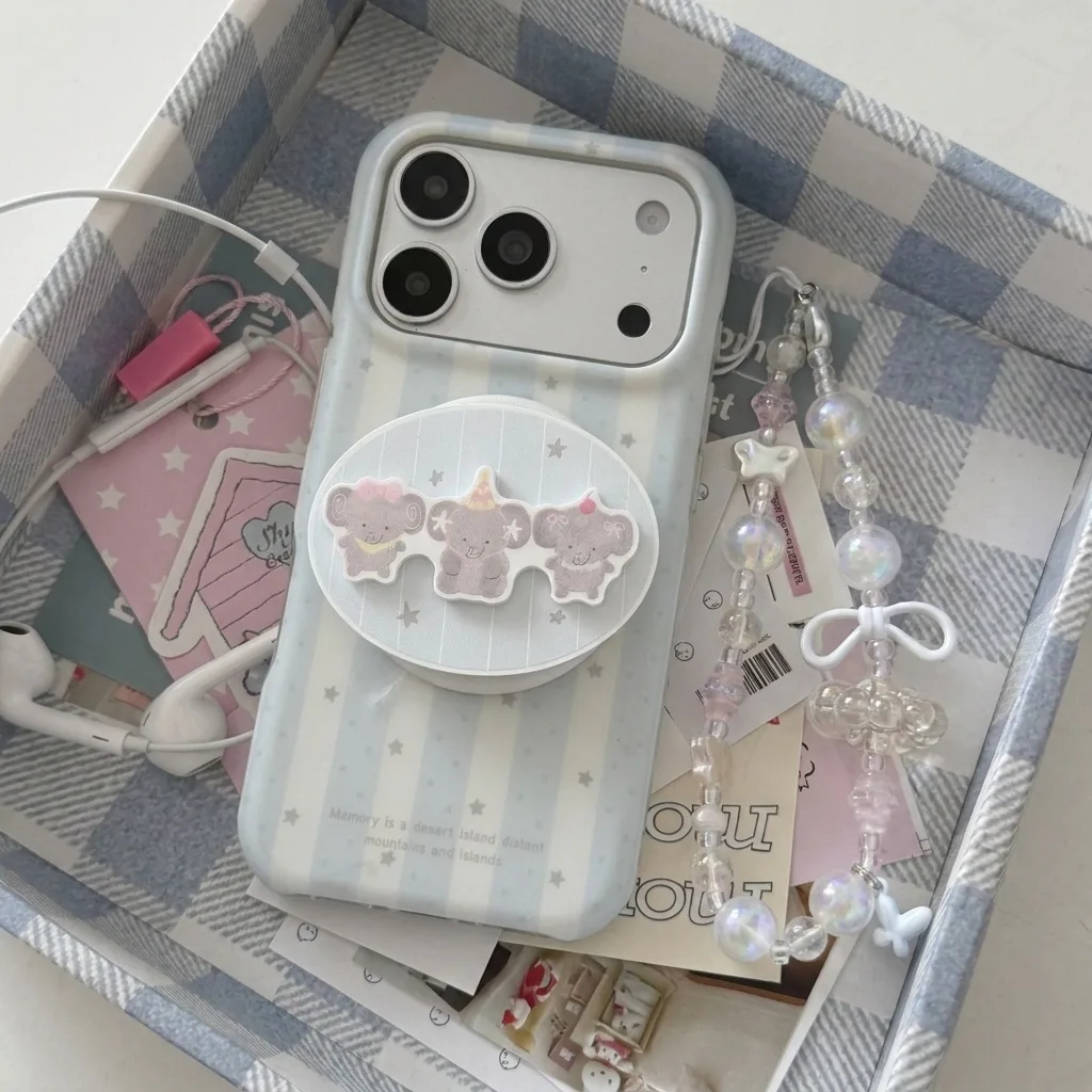 Pastel iPhone case with stripes, stars, and a cute bear trio grip on the back.