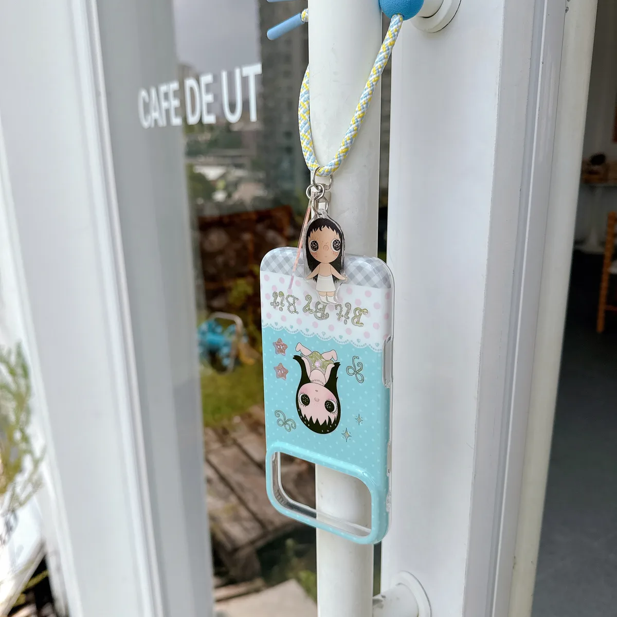 Kawaii Bit By Bit phone case with cute doll print and pastel blue design for iPhone 17 16 15 Pro Max