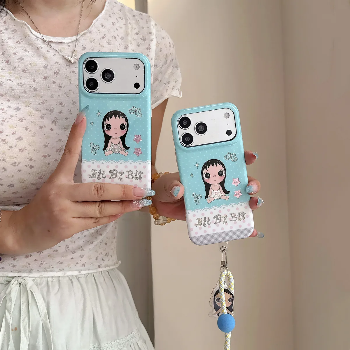 Kawaii Bit By Bit phone case with cute doll print and pastel blue design for iPhone 17 16 15 Pro Max