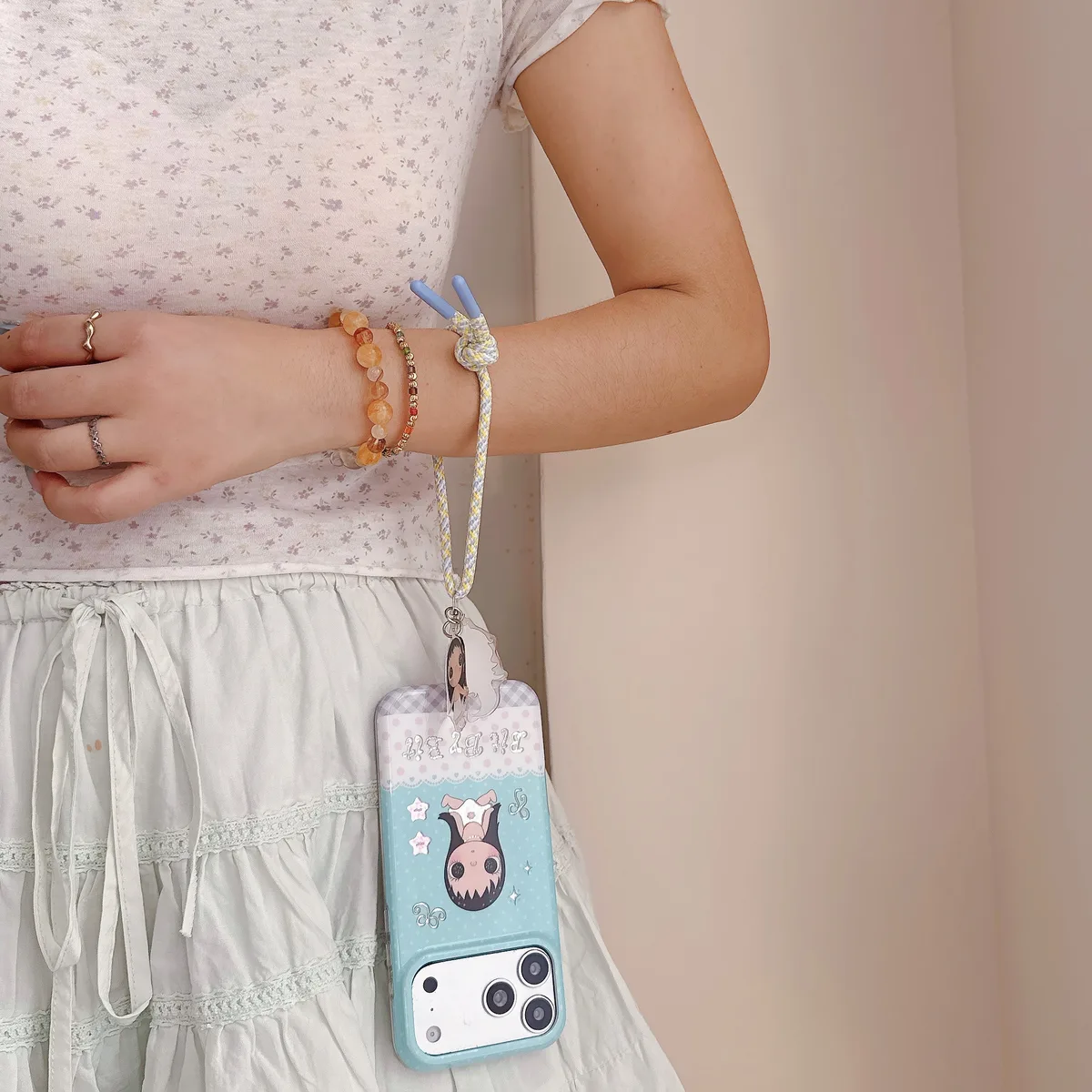 Kawaii Bit By Bit phone case with cute doll print and pastel blue design for iPhone 17 16 15 Pro Max