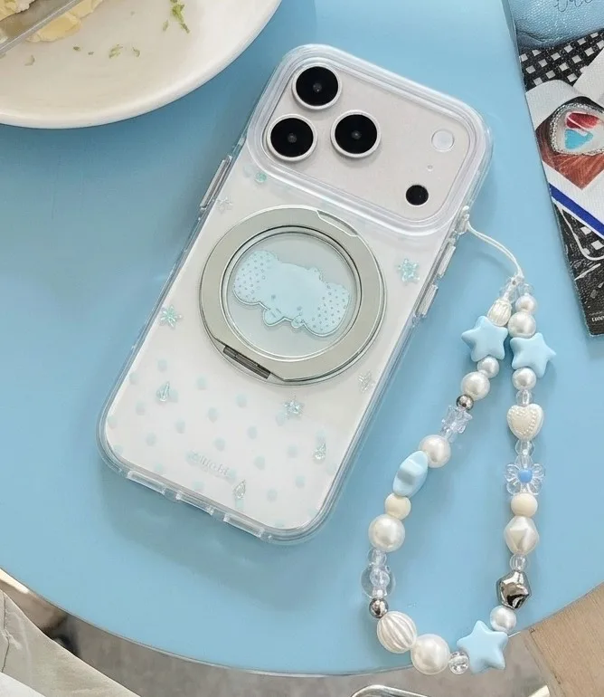 Clear phone case with Cinnamoroll design, a magnetic ring, and a pastel beaded charm strap