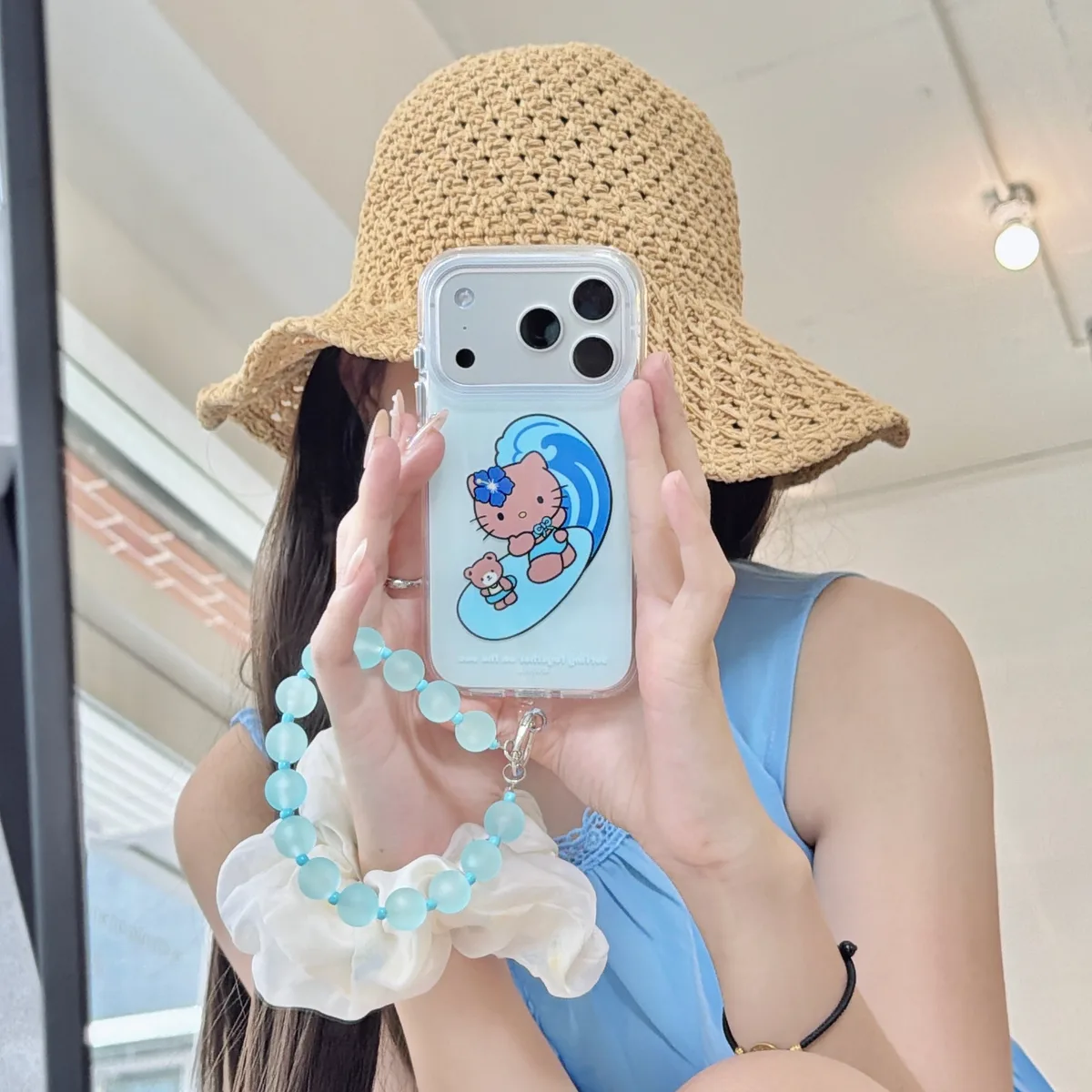 Hello Kitty Surfing Kitty Blue Wave Phone Case with Beaded Strap for iPhone 17 16 15 Pro Max