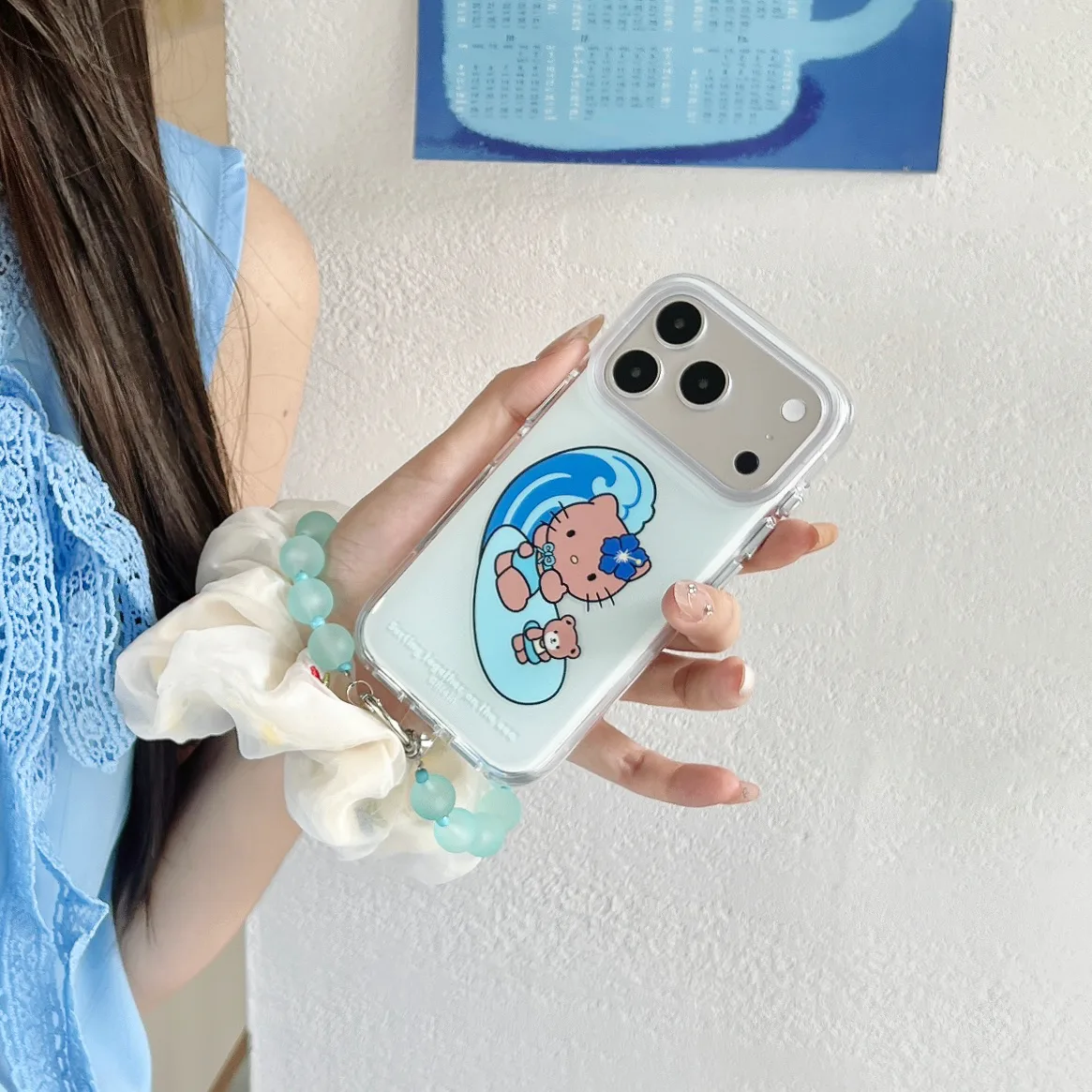Hello Kitty Surfing Kitty Blue Wave Phone Case with Beaded Strap for iPhone 17 16 15 Pro Max