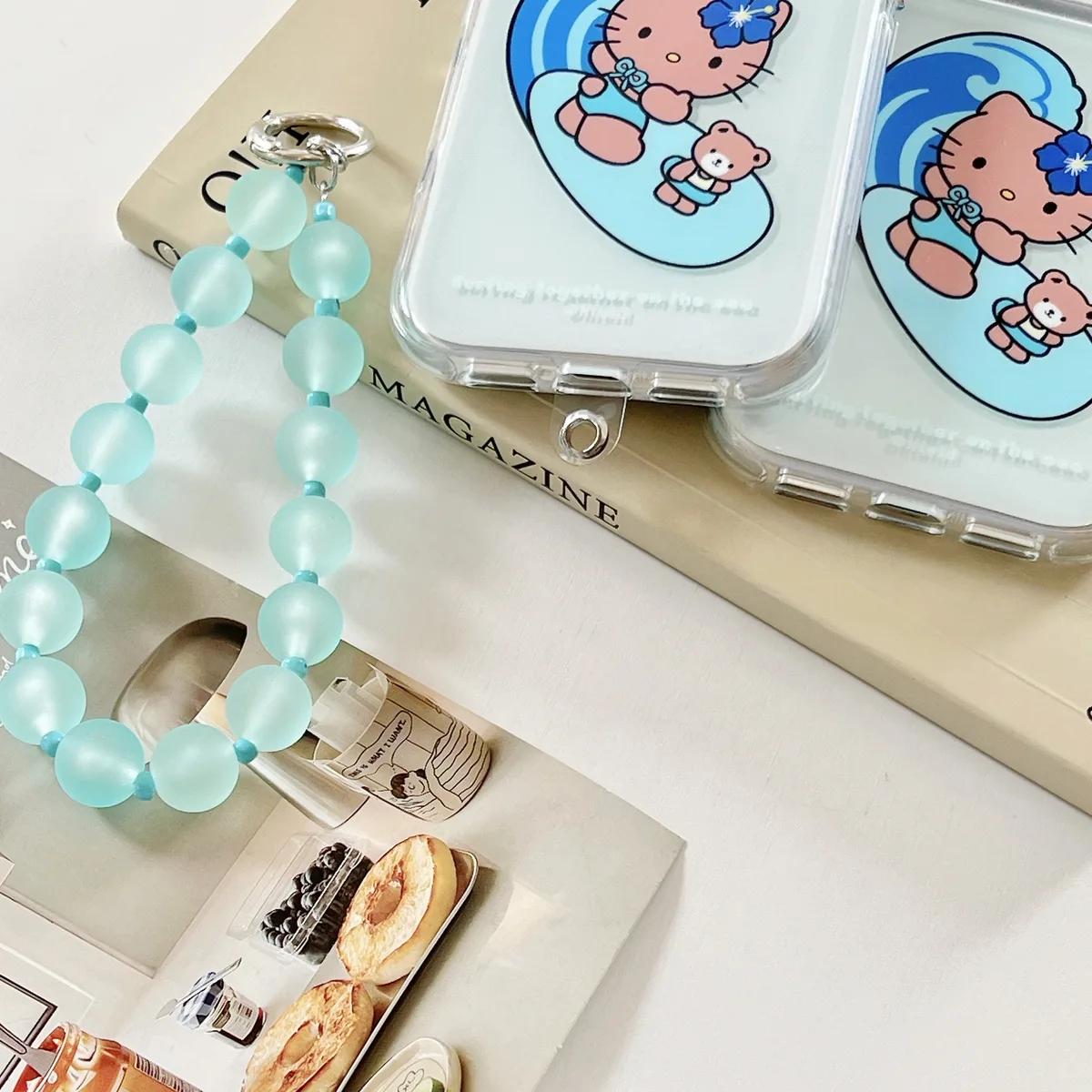 Hello Kitty Surfing Kitty Blue Wave Phone Case with Beaded Strap for iPhone 17 16 15 Pro Max