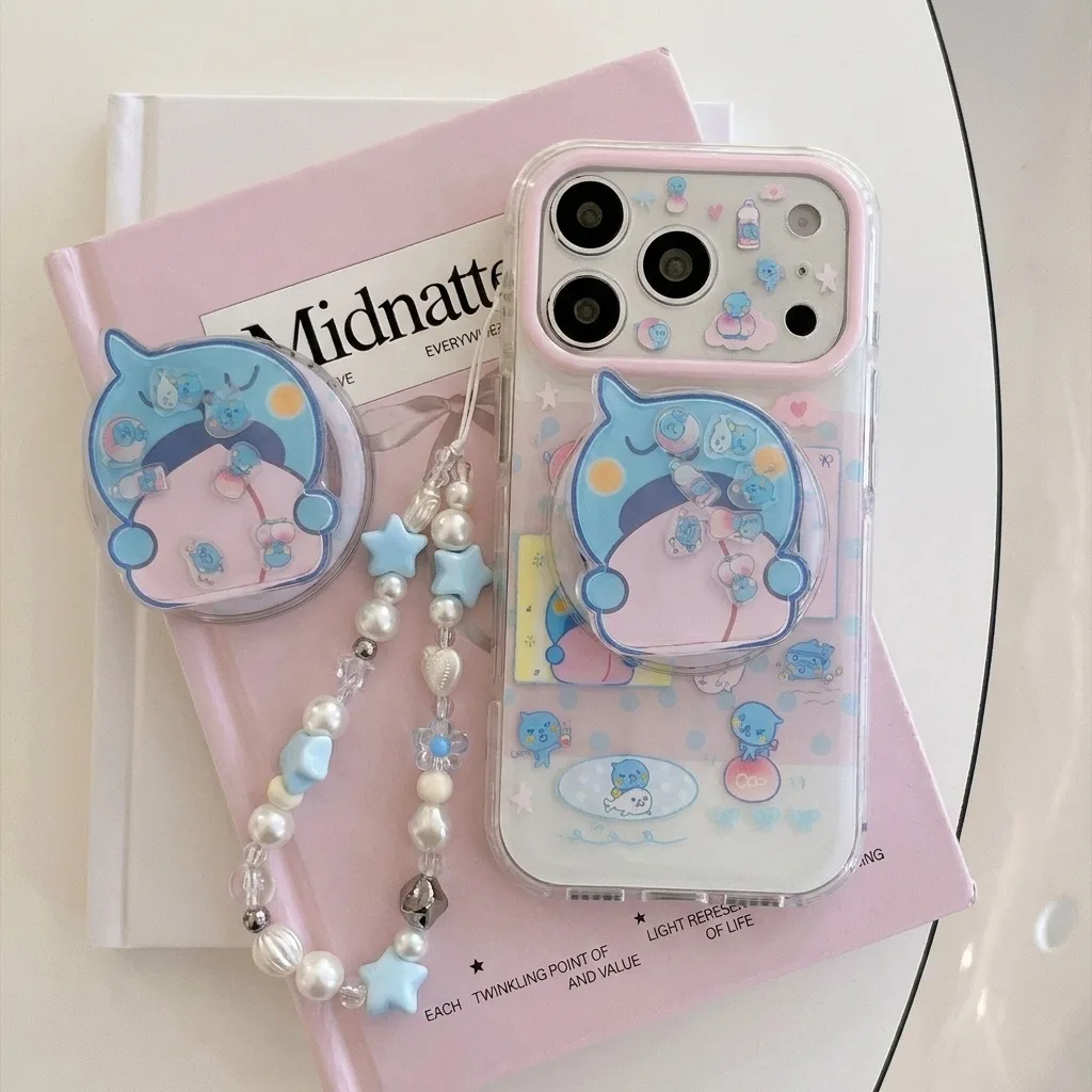 Clear pastel phone case with blue bear character art, pop-out grip, and beaded charm