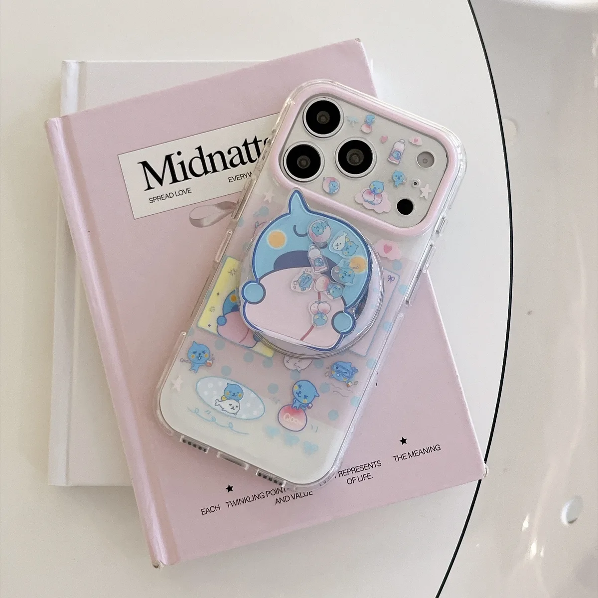 Cute blue bear clear phone case with beaded charm and pop-out grip for iPhone 17 16 15 Pro Max — MagSafe
