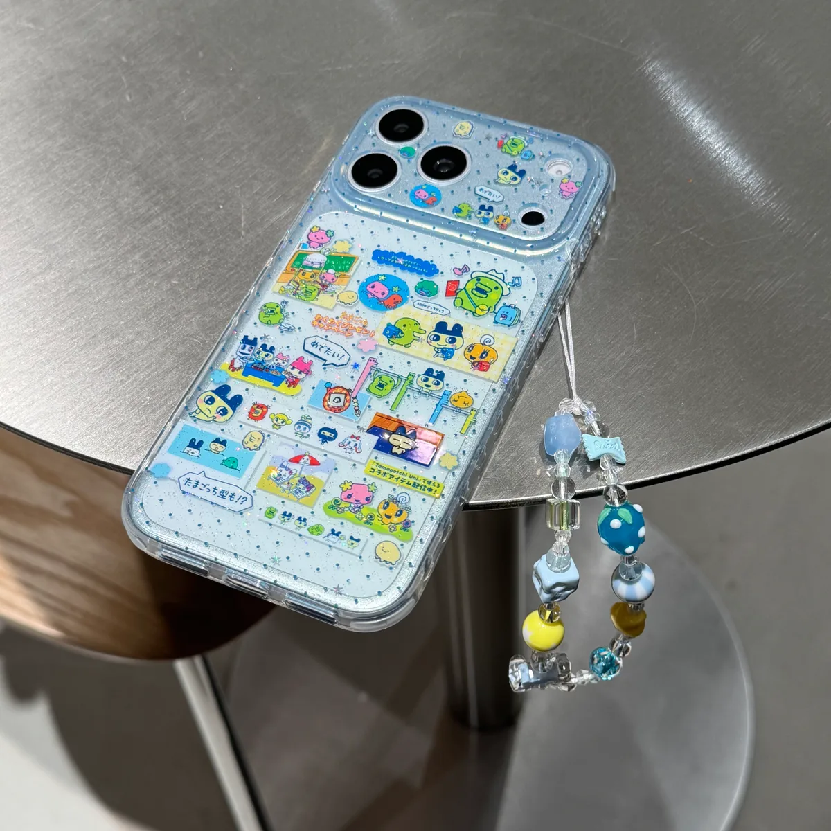 Tamagotchi 9+6 Double-Sided Glitter Case with Beaded Strap for iPhone 17 16 15 Pro Max