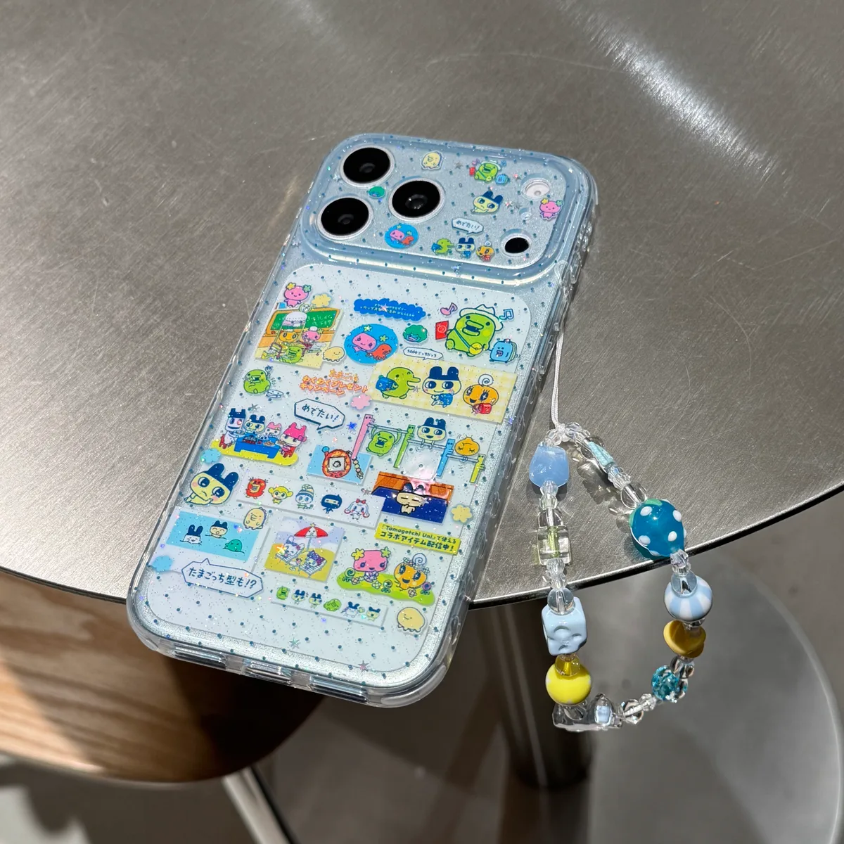 Tamagotchi 9+6 Double-Sided Glitter Case with Beaded Strap for iPhone 17 16 15 Pro Max