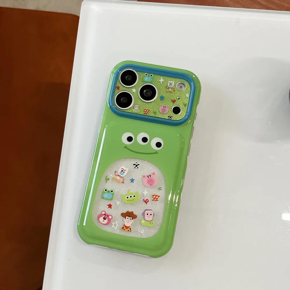 Green Alien 3-Eyes Glitter Bubble Phone Case for iPhone 17 16 15 Pro Max