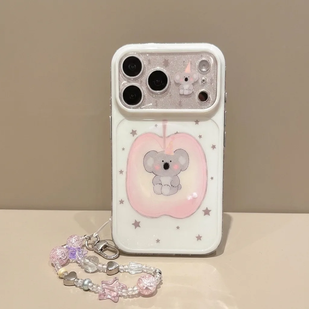 Clear phone case with a glittery camera cover, koala print, and beaded charm strap