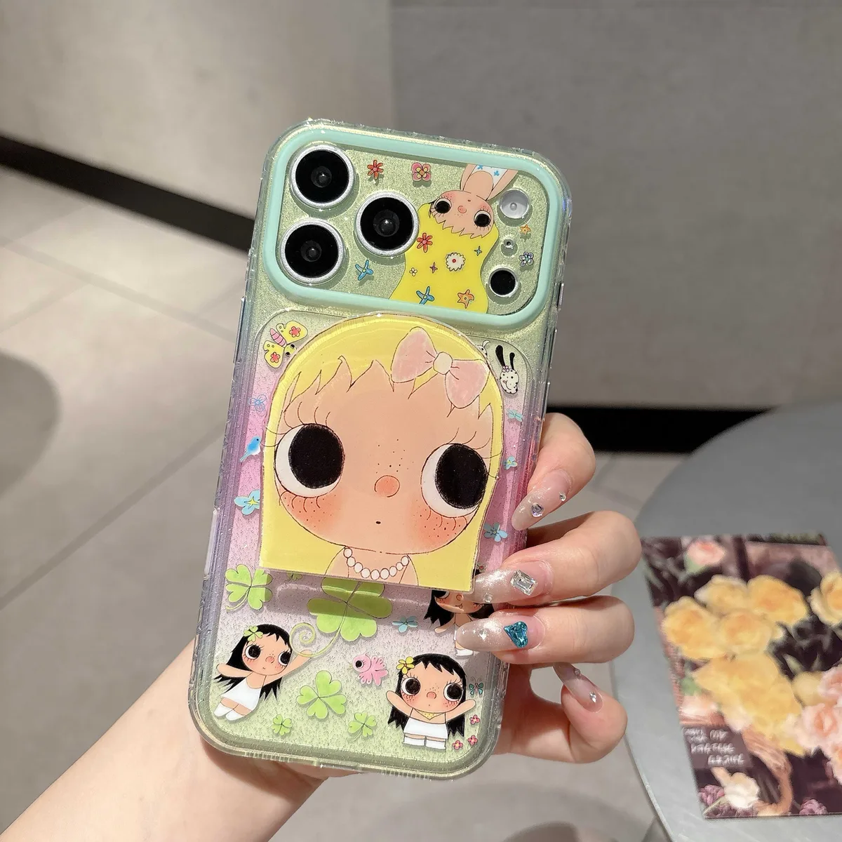 Cute glitter phone case with doll art and beaded charm strap for iPhone 17 16 15 Pro Max