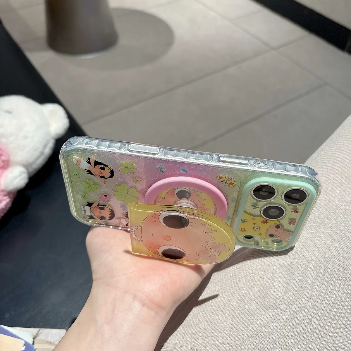 Cute glitter phone case with doll art and beaded charm strap for iPhone 17 16 15 Pro Max