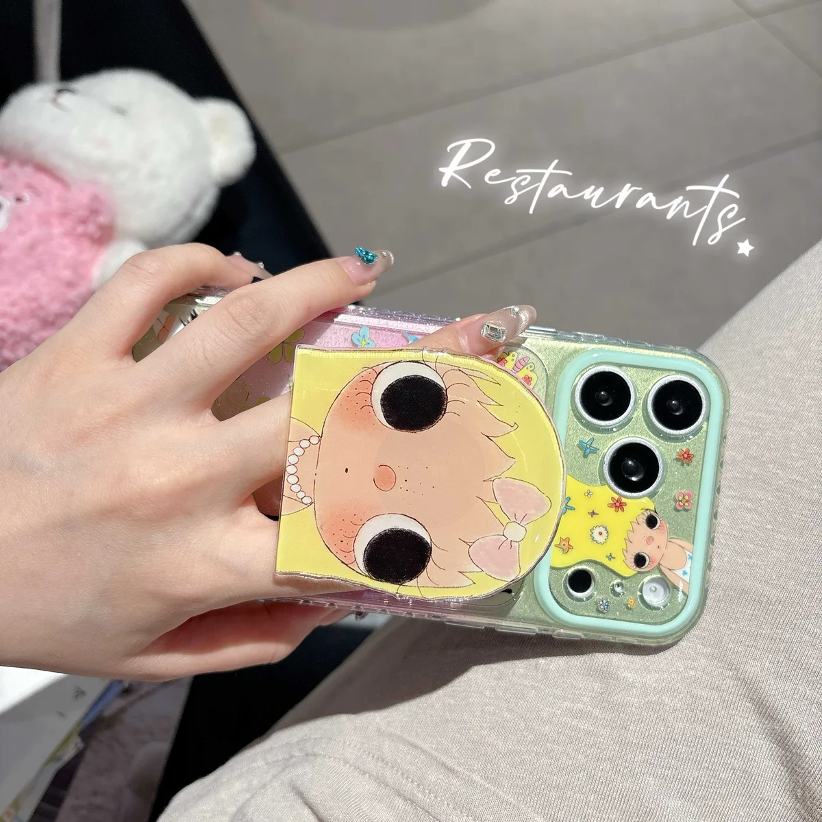 Cute glitter phone case with doll art and beaded charm strap for iPhone 17 16 15 Pro Max