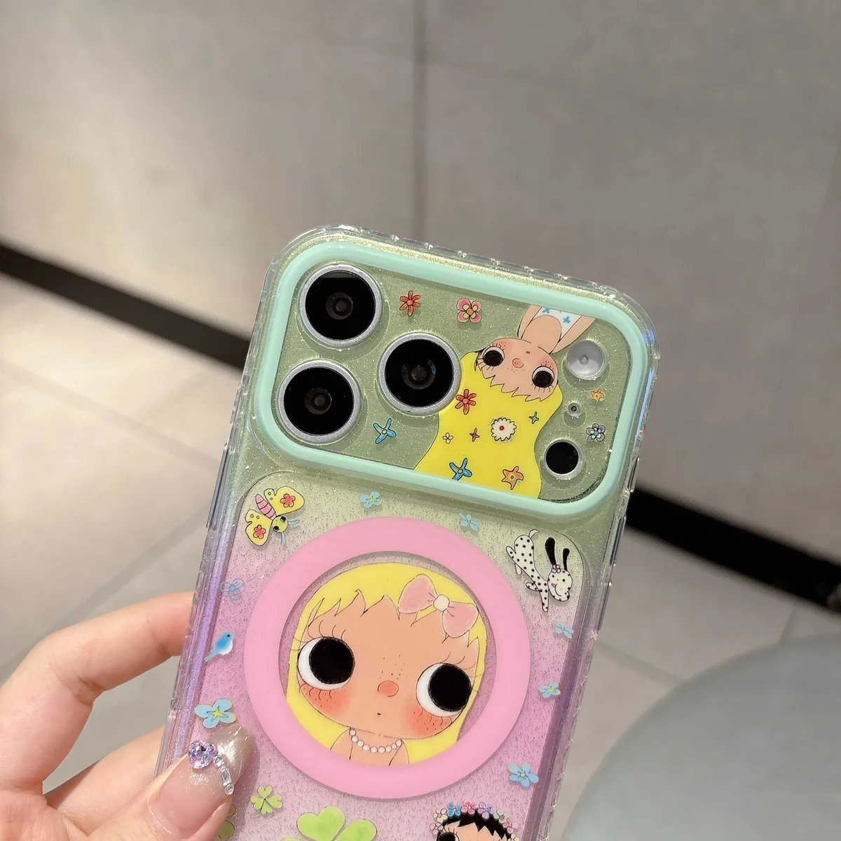 Cute glitter phone case with doll art and beaded charm strap for iPhone 17 16 15 Pro Max
