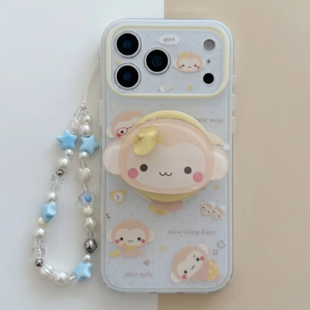 Clear phone case with pastel monkey art, a large 3D grip, and a beaded strap