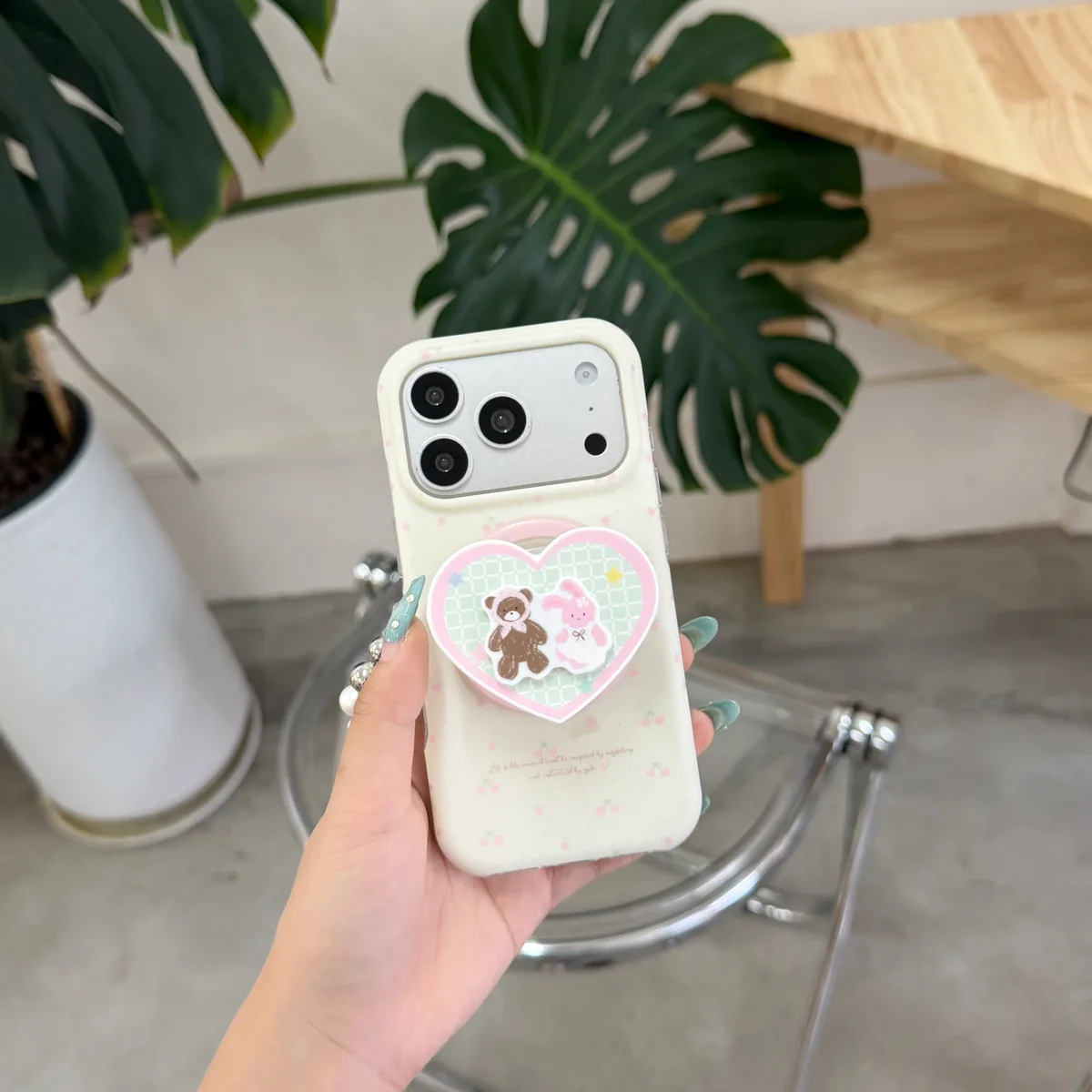 Cute pastel heart phone case with beaded strap and character charm for iPhone 17 16 15 Pro Max