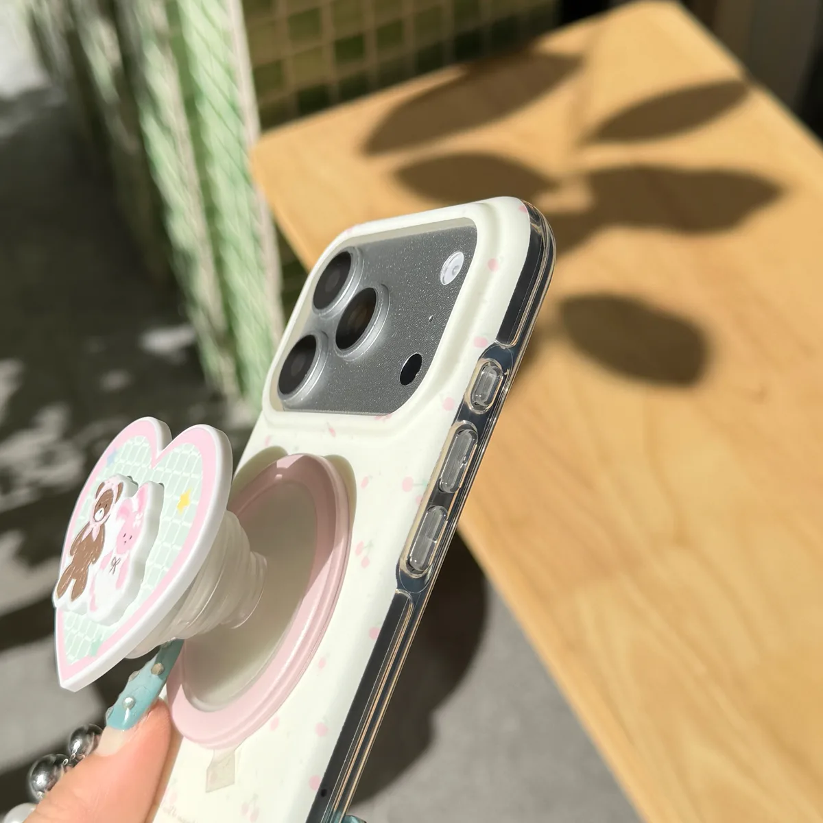 Cute pastel heart phone case with beaded strap and character charm for iPhone 17 16 15 Pro Max
