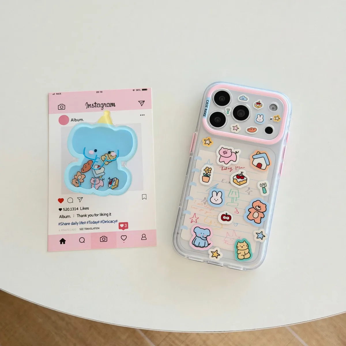 Clear pastel phone case with blue elephant charm and beaded wrist strap for iPhone 17 16 15 Pro Max