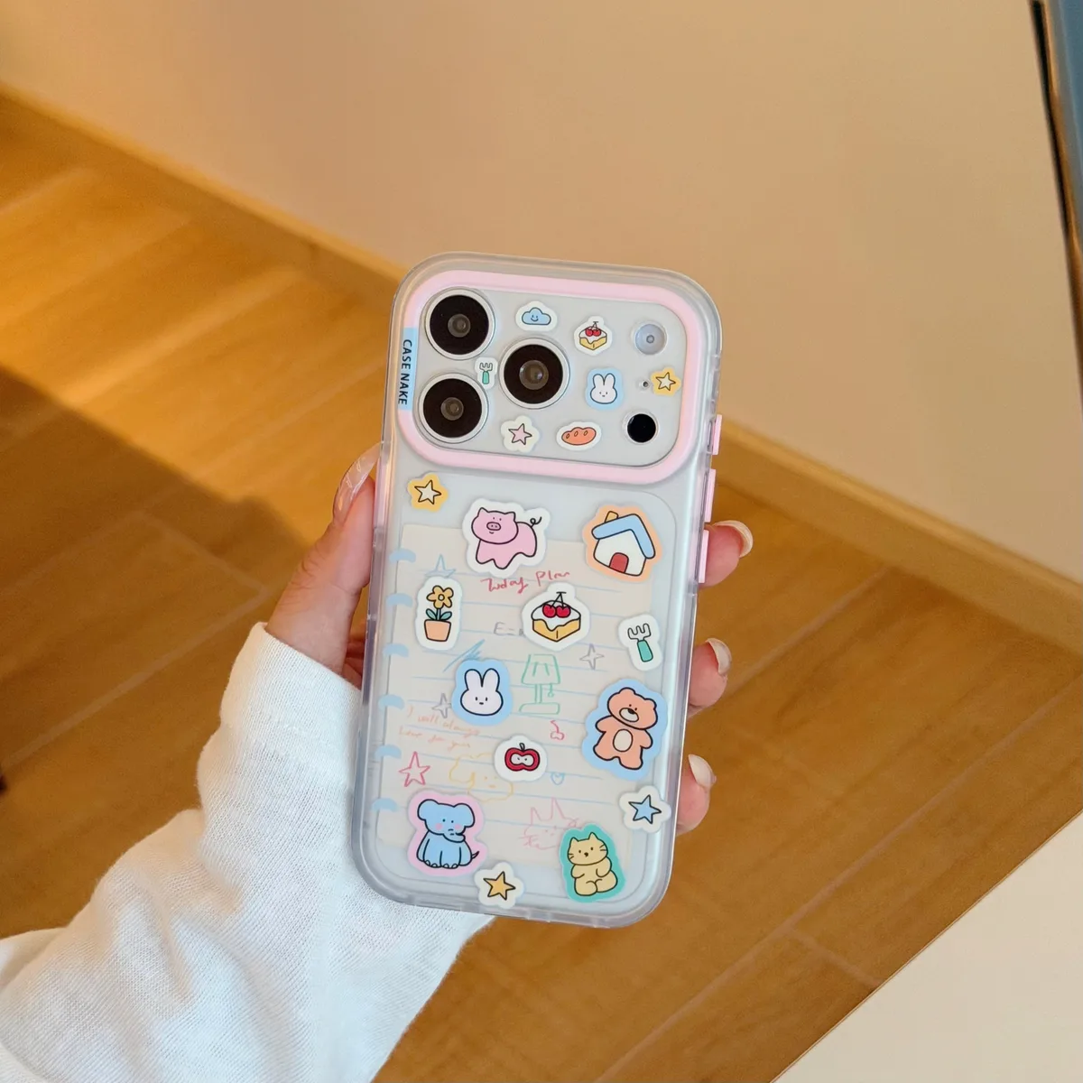 Clear pastel phone case with blue elephant charm and beaded wrist strap for iPhone 17 16 15 Pro Max