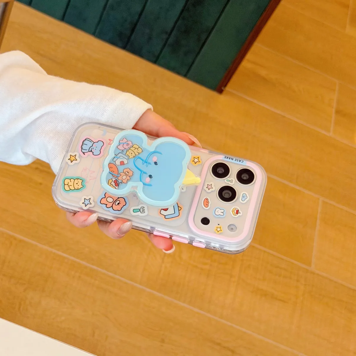 Clear pastel phone case with blue elephant charm and beaded wrist strap for iPhone 17 16 15 Pro Max