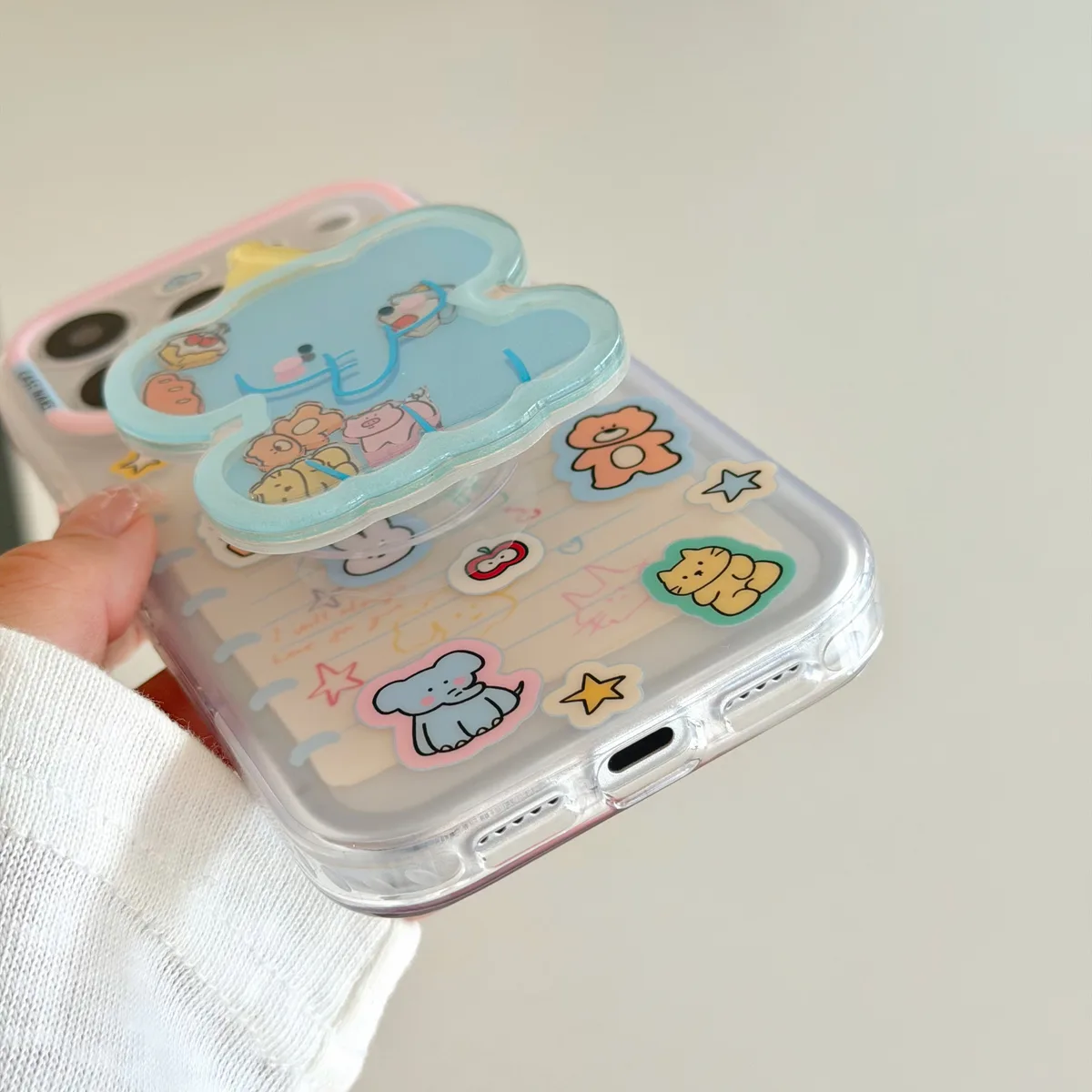 Clear pastel phone case with blue elephant charm and beaded wrist strap for iPhone 17 16 15 Pro Max