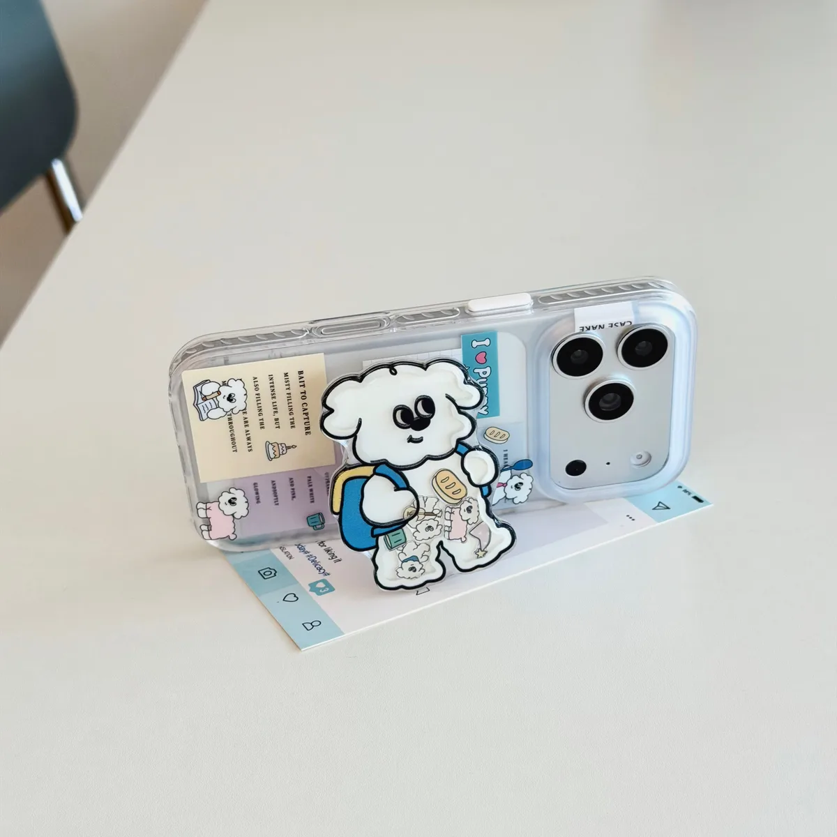 Clear phone case with a cute white bear character and pastel sticker collage design