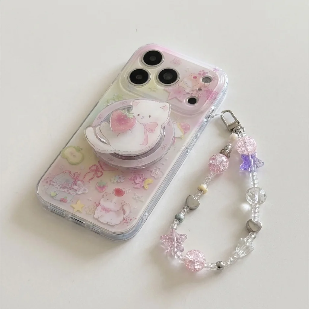 Clear pastel phone case with a bear illustration, strawberry accents, and a beaded wrist strap
