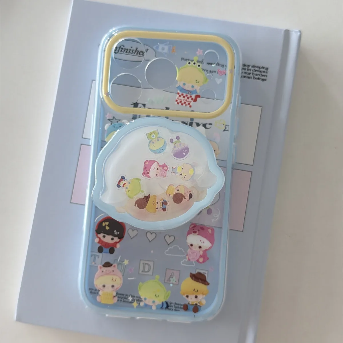 Toy Story character clear phone case with pastel charm and magnetic grip accessory for iPhone 17 16 15 Pro Max — MagSafe