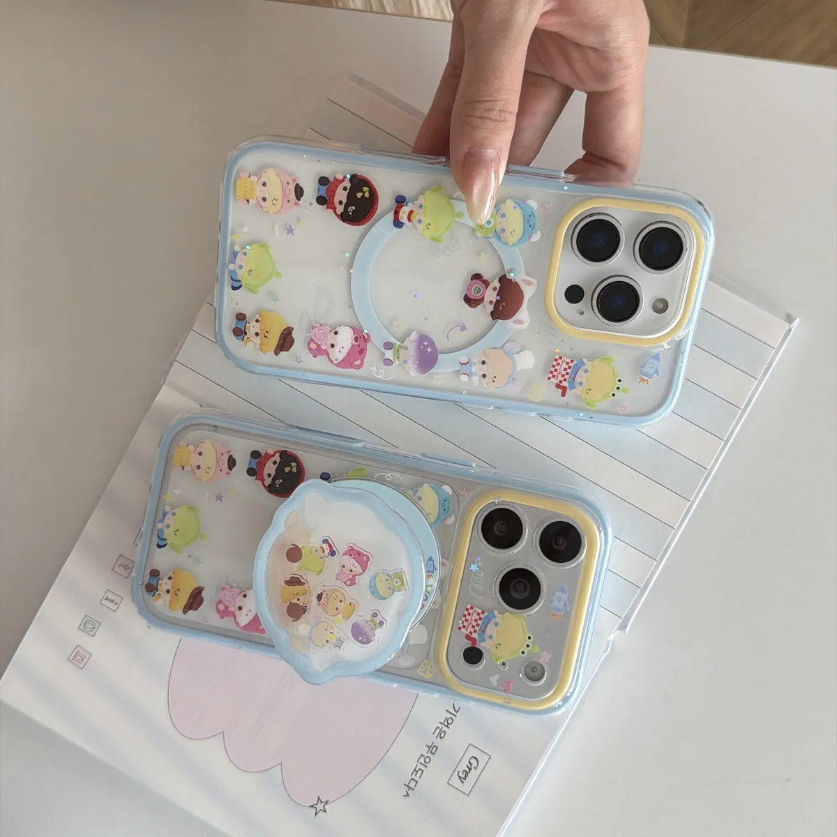 Toy Story character clear phone case with pastel charm and magnetic grip accessory for iPhone 17 16 15 Pro Max — MagSafe