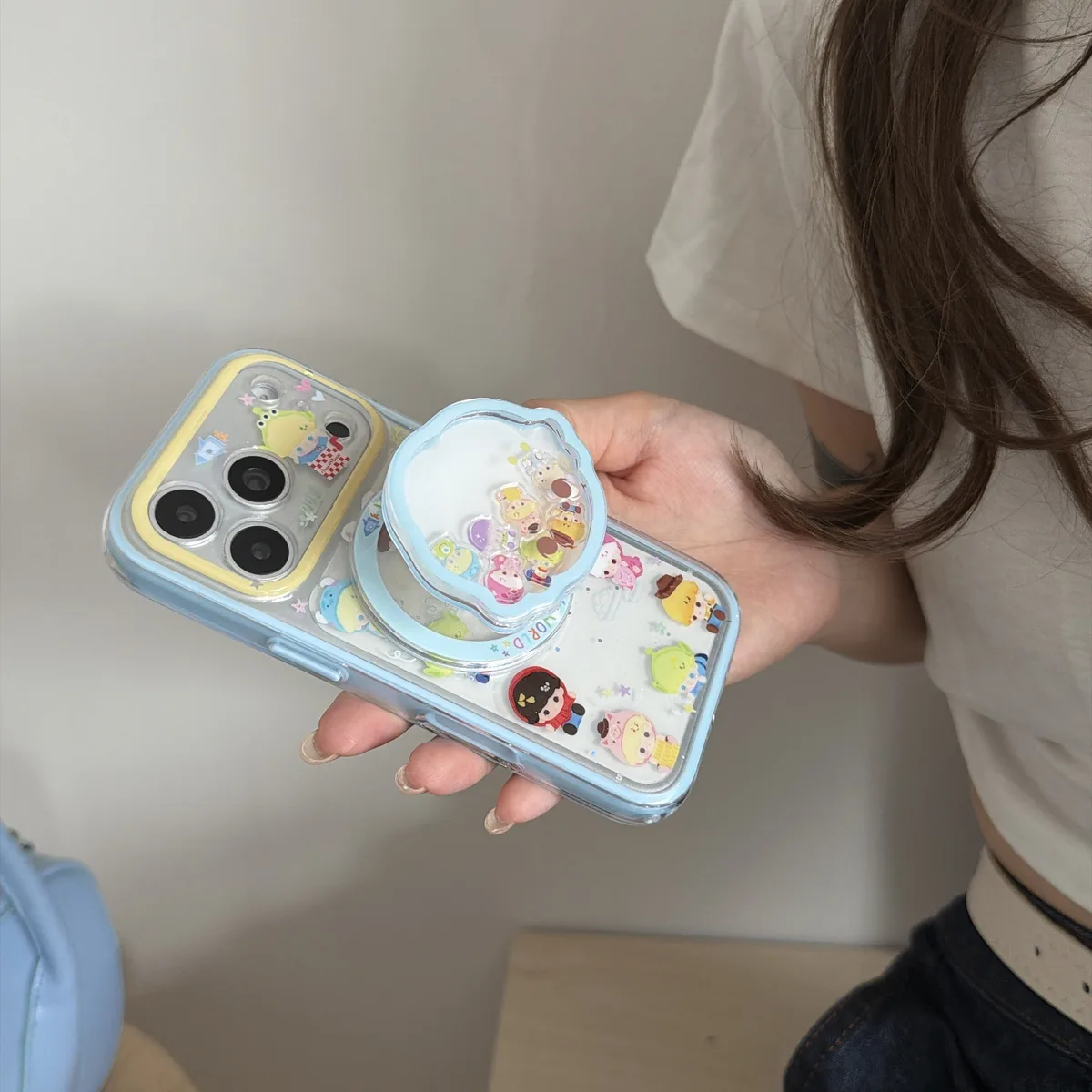 Toy Story character clear phone case with pastel charm and magnetic grip accessory for iPhone 17 16 15 Pro Max — MagSafe