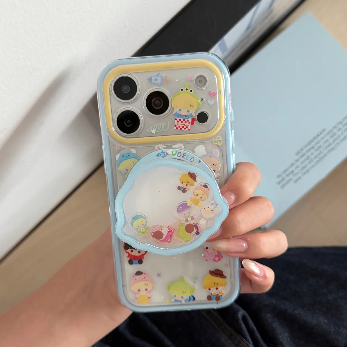 Toy Story character clear phone case with pastel charm and magnetic grip accessory for iPhone 17 16 15 Pro Max — MagSafe