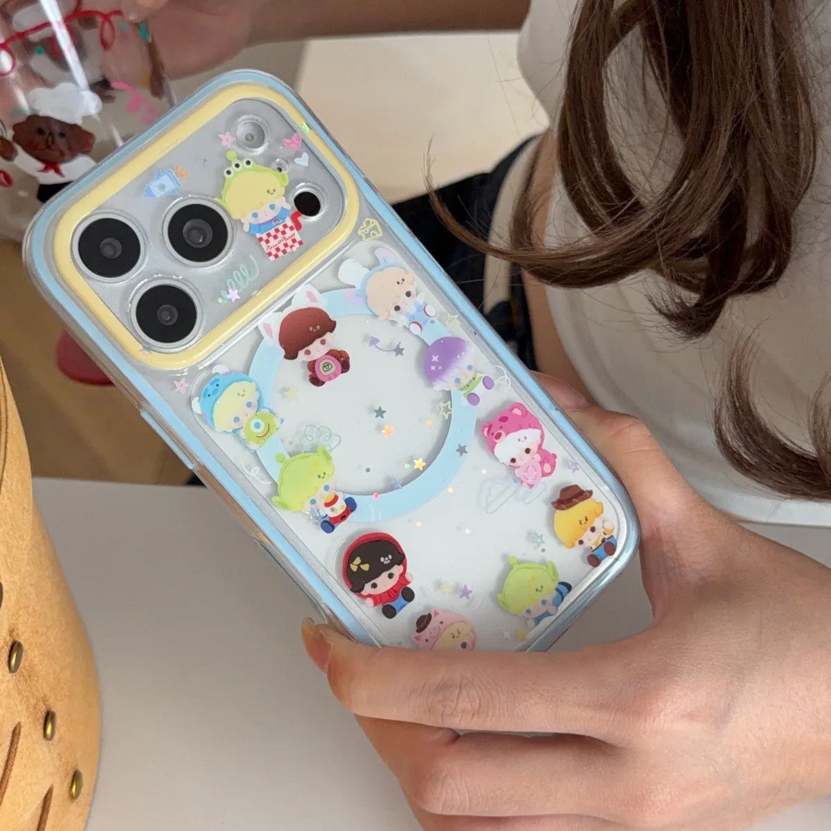 Toy Story character clear phone case with pastel charm and magnetic grip accessory for iPhone 17 16 15 Pro Max — MagSafe