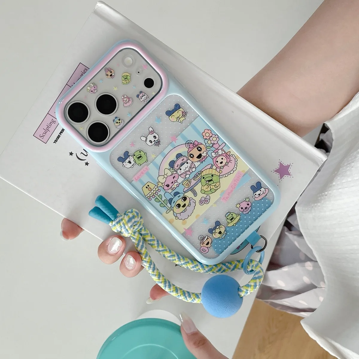 Tamagotchi Pastel Phone Case with Braided Wrist Strap for iPhone 17 16 15 Pro Max