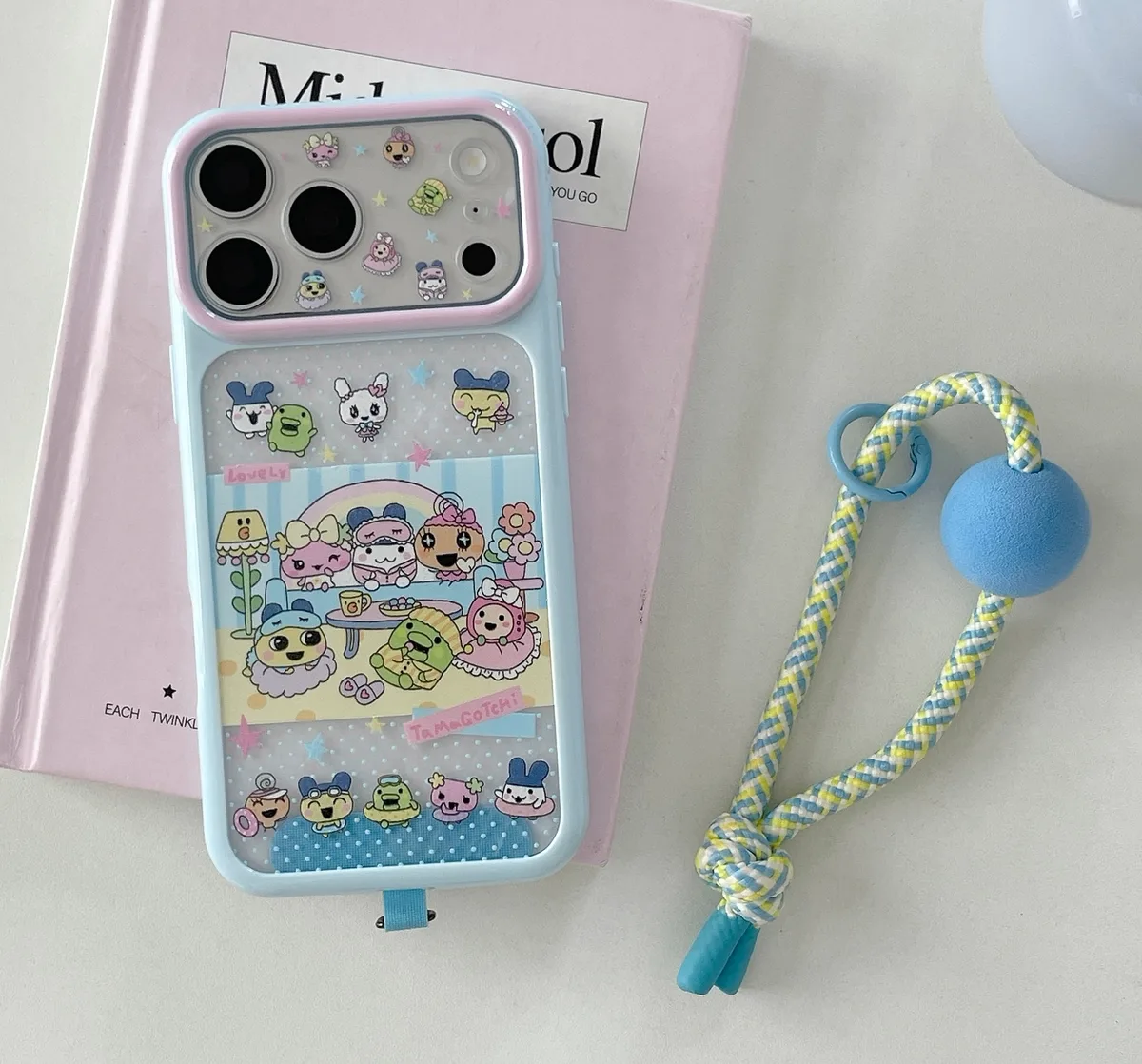Tamagotchi Pastel Phone Case with Braided Wrist Strap for iPhone 17 16 15 Pro Max