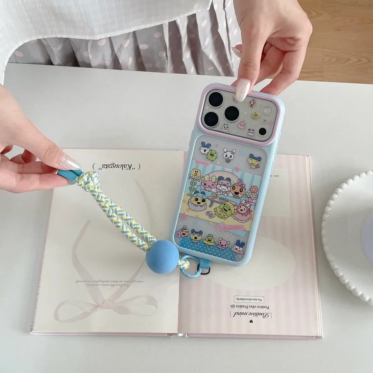 Tamagotchi Pastel Phone Case with Braided Wrist Strap for iPhone 17 16 15 Pro Max