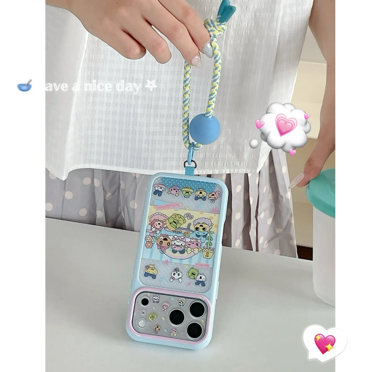 Tamagotchi Pastel Phone Case with Braided Wrist Strap for iPhone 17 16 15 Pro Max