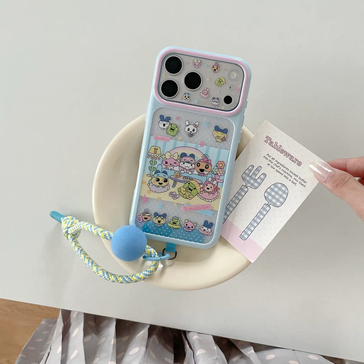 Tamagotchi Pastel Phone Case with Braided Wrist Strap for iPhone 17 16 15 Pro Max